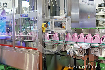 Washing liquid filling production line Editorial Stock Photo