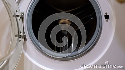 Washing machine with opened drum, ready to wash clothes, specifications concept Stock Photo