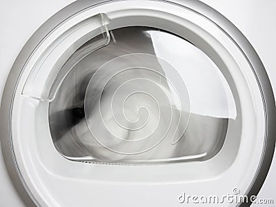 Washing machine porthole closeup working front view Stock Photo