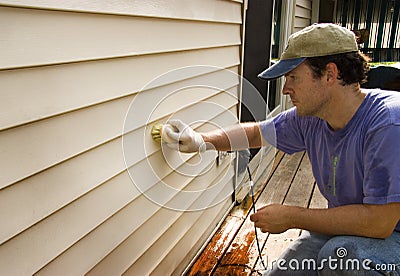 Washing Vinyl Siding of House Stock Photo