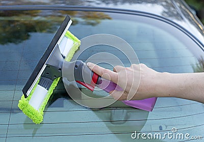 Washing the windscreen Stock Photo