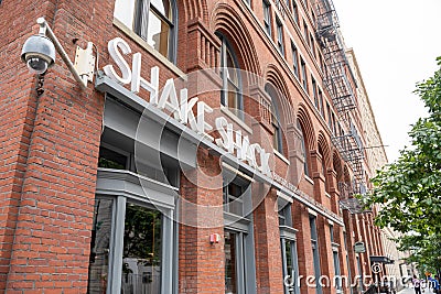 Washington, DC - August 5, 2019: Exterior sign and entrance to the Shake Shack, a fast casual restaurant selling burgers and fries Editorial Stock Photo