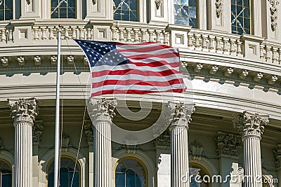 Washington DC Capitol detail with american flag Stock Photo