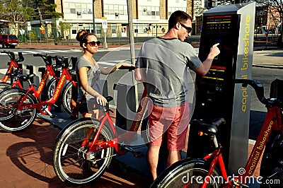 Washington, DC: Couple Renting Bicycles Editorial Stock Photo