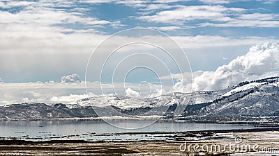 Washoe Lake in Washoe Valley near Reno Nevada in early springtime after a a recent snowfall. Stock Photo