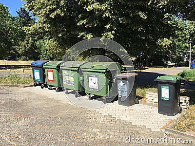 Waste containers for recyclables, organics and paper Editorial Stock Photo