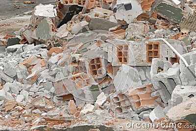 waste from deconstruction demolition: a pile of rubble made of bricks and cement concrete blocks Stock Photo