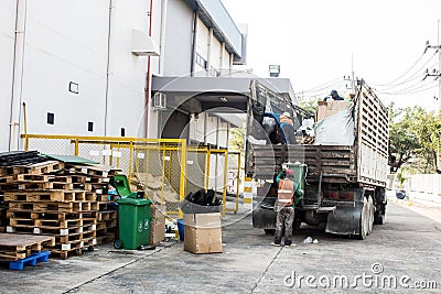 Waste Management, The garbage truck with worker Editorial Stock Photo
