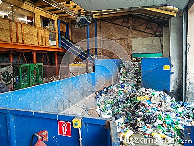 Waste processing plant. Recycling and storage of waste for further disposal. Separate and sorting garbage collection Editorial Stock Photo