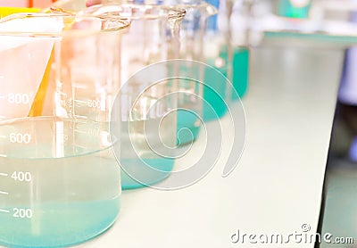 Waste water sample in beakers coagulation and flocculation method with Copper Sulfate and using Jar test for forming precipitation Stock Photo