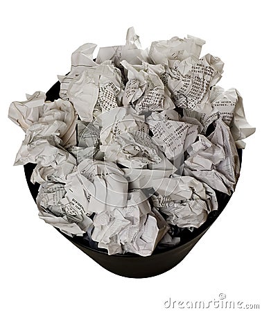 Wastepaper basket full of crumpled paper Stock Photo