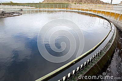 Wastewater Flows Over Weirs at a Wastewater treatment Plant Stock Photo