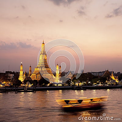 Wat Arun across Chao Phraya River during sunset Stock Photo