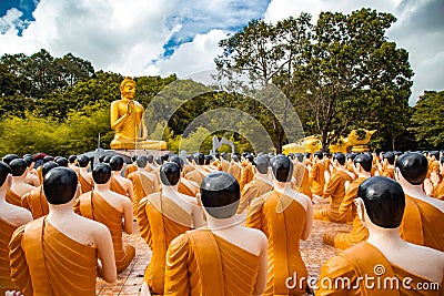 Wat Chak Yai temple, golden buddha and hundreds of monks, in Chanthaburi, Thailand Editorial Stock Photo