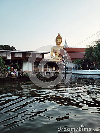 Wat Pak Nam, old temple with the big Buddha on the west side of Bankok, Thailand Editorial Stock Photo