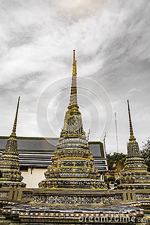 Wat Pho Temple of the Reclining Buddha, or Wat Phra Chetuphon, is located behind the Temple of the Emerald Buddha and a must-do Stock Photo