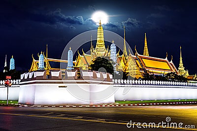 Wat phra keaw with full moon at night in Bangkok. Stock Photo
