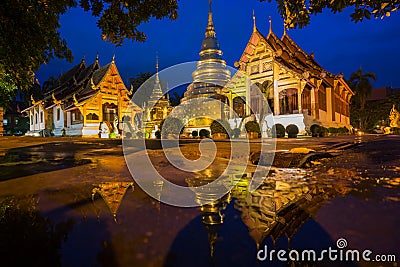 Wat Phra Sing with the water reflection after rainning, Chiang Mai, Thailand. Stock Photo