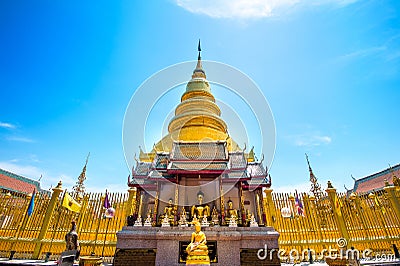 Wat Phrathat Hariphunchai Golden pagoda. Stock Photo