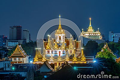 Wat Ratchanadda and Wat Saket that are decorated with colorful lights during the night Editorial Stock Photo