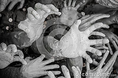 Sculpture of hundreds outreaching hands. White Temple, Chiang R Editorial Stock Photo