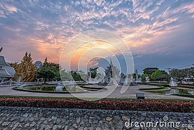 Wat Rong KhunWhite templeat sunset in Chiang Rai,Thailand. Editorial Stock Photo