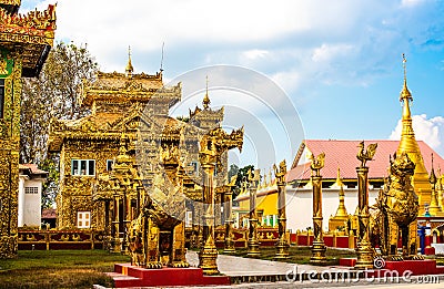Wat Thai Wattanaram It is a Thai temple that is built in Myanmar style. There is a beautiful golden color in Mae Sot District Stock Photo