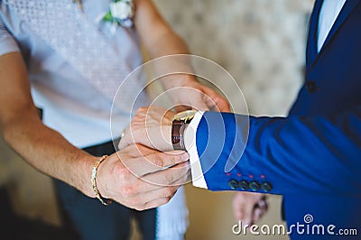 Watch on Groom's Hand Stock Photo