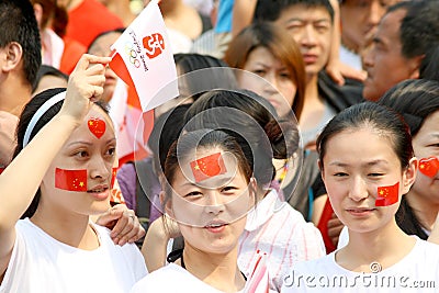 Watch the young girl that the Olympics lighted tor Editorial Stock Photo