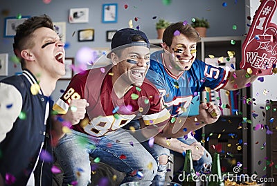 Watching football game Stock Photo