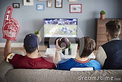 Watching football game Stock Photo