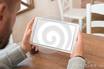 Watching movie or read news on tablet in horizontal position Stock Photo