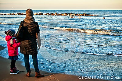 Watching people swimming in winter sea Editorial Stock Photo