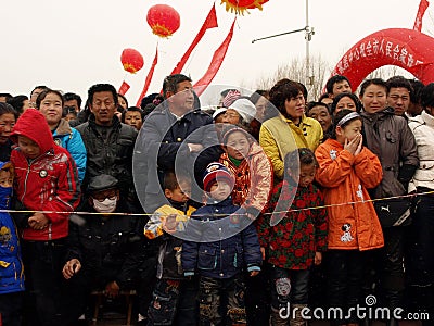 Watching traditional dance Yangge in the snow Editorial Stock Photo