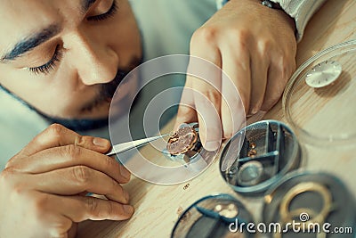 Watchmaker at work Stock Photo