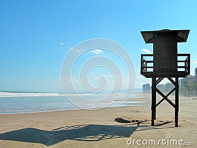 Watchtower and his shadow on the sand. Stock Photo