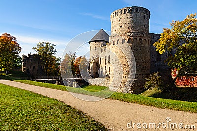 Watchtower and surrounding wall of castle ruins in Cesis town, Latvia Stock Photo