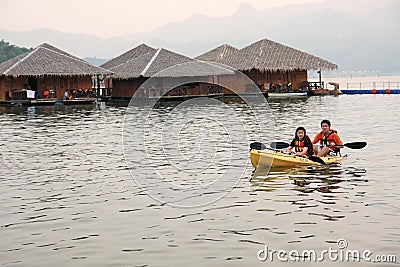 Water activity at the floating house residence in Kanchanaburi, Thailand Editorial Stock Photo