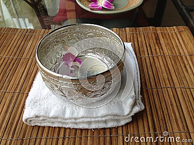 Water in aluminium bowl Stock Photo