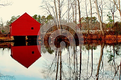 Water barn reflected on lake Stock Photo