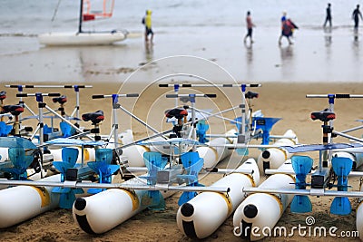 Water bicycles on the sandy beach Stock Photo