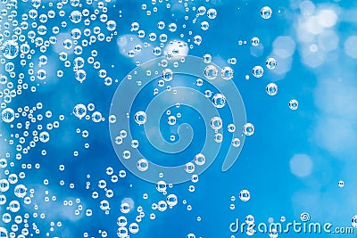 Water. Blue background. Macro bubbles. Stock Photo