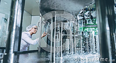 Water bottling line for processing and bottling pure spring water Stock Photo