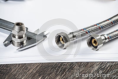 Water braided metal hose with internal screw Stock Photo