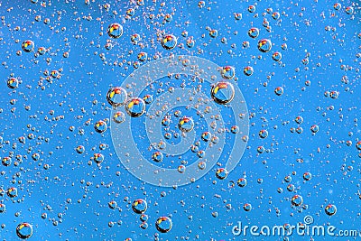 Water bubbles on blue background. Scientific image of cell membrane. Macro up of liquid substances. Abstract molecule atom sctruct Stock Photo