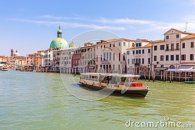 Water Bus and view of Venice city canal in Venice, Italy Editorial Stock Photo