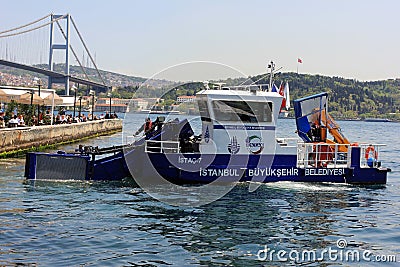 Water cleanning vehicle at Bosphorus, Istanbul, Turkey Editorial Stock Photo