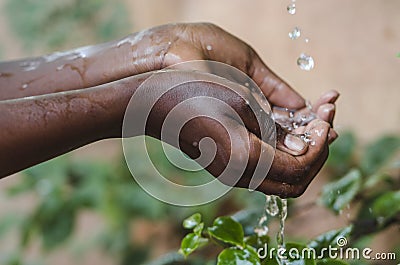 Water Climate Change Symbol: Handful Of Water Scarcity for Child Stock Photo