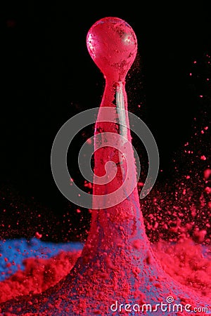 Water Cone, Magenta Powder Stock Photo