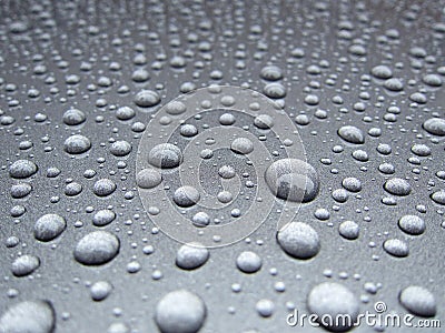 Water dew droplets on silver metallic paint background Stock Photo